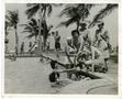 Photograph: [Members of the Women's Auxiliary Corps Hanging Out by a Pool]