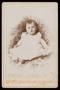 Photograph: [Portrait of an Unknown Baby in a Floral Chair]