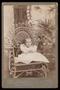 Photograph: [Portrait of an Unknown Baby in a Wicker Chair]