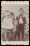 Photograph: [Portrait of Two Unknown Children With a Chair]