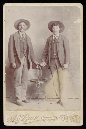 Primary view of object titled '[Portrait of Two Unknown Men with a Chair]'.