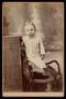 Photograph: [Portrait of an Unknown Child in a Rustic Chair]