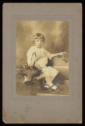 Primary view of object titled '[Portrait of an Unknown Girl Sitting with a Basket of Flowers]'.