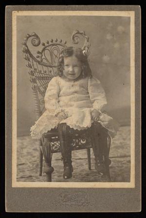 Primary view of object titled '[Portrait of a Child on a Wicker Chair]'.