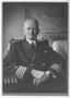 Photograph: [Portrait of Captain Chester W. Nimitz Sitting in Chair]