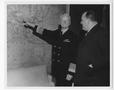 Primary view of [Fleet Admiral Chester W. Nimitz Points At a Map]