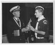 Photograph: [Fleet Admiral Chester W. Nimitz Receives a Statuette]