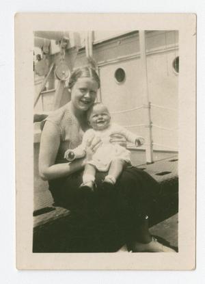 Primary view of object titled '[Kate Nimitz Holds Mary Nimitz on Board the U.S.S. Rigel]'.