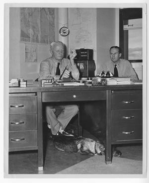 Primary view of object titled '[Admiral Chester W. Nimitz and Captain P. V. Mercer in an Office]'.
