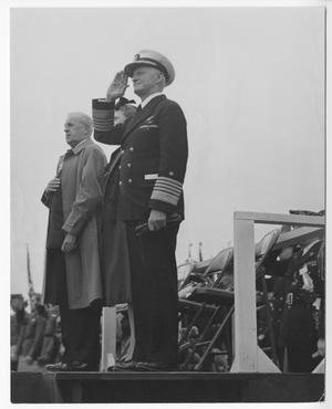 Primary view of object titled '[Fleet Admiral Chester W. Nimitz Salutes on Stage]'.
