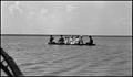 Photograph: [Group of people on a raft]
