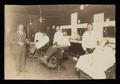 Photograph: [Charles W. Norris in a Barber Shop]