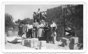Primary view of object titled '[Group of People at a Construction Site]'.
