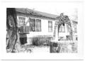 Photograph: [Well Outside of a House]