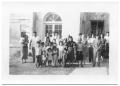 Photograph: [Large Congregation Standing in Front of a Church]