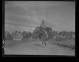 Photograph: [Negative of a Solider on a Galloping Horse]