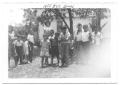 Photograph: [Young Hispanic Boys Standing Under a Tree]
