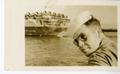 Photograph: [Sailor with Ship in Background]