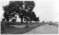 Photograph: [Photograph of Sitting Area Next to Road]