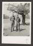 Photograph: [Two Men in Front of a Tree]