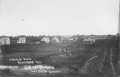 Primary view of [Indiana Town in Rosenberg, a horse-drawn buggy is on the right.]