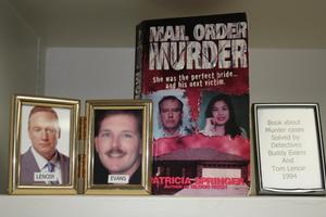 Primary view of object titled '[Image of a case displaying the book "Mail Order Murder", a case solved by Detectives Tom LeNoir and Buddy Evans]'.