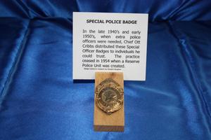Primary view of object titled '[Image of a Special Police Badge issued by Chief Ott Cribbs]'.