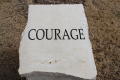 Photograph: [Heroes' Park "Courage" character trait of a hero stone]