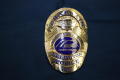 Photograph: [Image of an APD Chaplain Super Bowl badge, 2011]