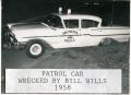 Photograph: [Arlington patrol car wrecked by Officer Bill Wills, 1958]