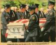 Primary view of [Arlington Police Officer Terry Lewis's casket carried by the Honor Guard during his funeral, newspaper clipping, 1992]
