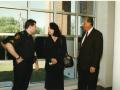 Photograph: [Arlington Police Officer Chip Oxendine with his parents]