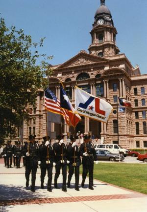 Primary view of object titled '[APD Honor Guard "Color Guard" in front of Tarrant County Courthouse]'.