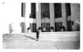 Photograph: [Emma Phillippi standing in front of a building at the World's Fair i…