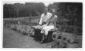 Thumbnail image of item number 1 in: '[Bob McGlamery and Mlidred Phillips sitting on a bench at Weatherford College]'.
