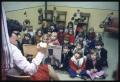 Thumbnail image of item number 1 in: '[Carolyn Gilles Reads to Children]'.
