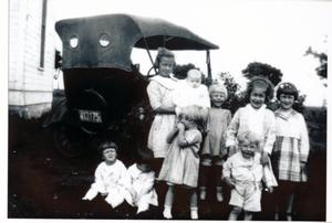 Primary view of object titled '[Children in front of Model T]'.