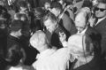 Photograph: [Senator Ralph Yarborough surrounded by press outside Parkland Hospit…