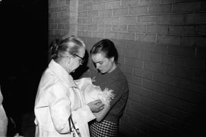 Primary view of object titled '[Marina, Rachel, and Marguerite Oswald at Dallas Police Headquarters]'.