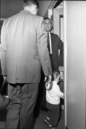 Primary view of object titled '[Robert and June Oswald at Dallas Police headquarters]'.