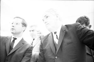 Primary view of object titled '[Dallas County Criminal District Attorney Henry Wade with reporters]'.
