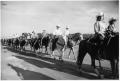Photograph: Texas Sesquicentennial Wagon Train on Its Way to Whitesboro