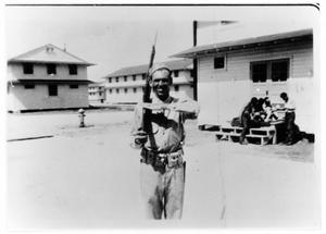 Soldier posing with his bayonet at Camp Wallace