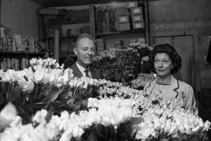 Primary view of object titled '[Dallas florists with roses to be used to decorate the Dallas Trade Mart]'.