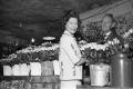 Thumbnail image of item number 1 in: '[Dallas florists with roses to be used to decorate the Dallas Trade Mart]'.