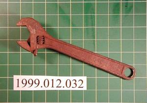 Primary view of object titled '[Crescent wrench with an adjustable C-shaped head]'.