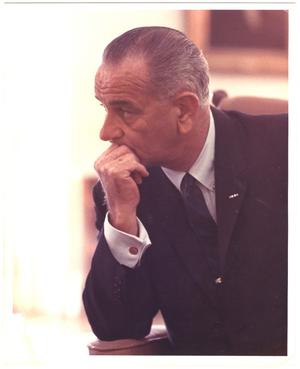 Primary view of object titled '[President Lyndon Baines Johnson leaning on arm]'.