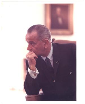 Primary view of object titled '[President Lyndon Baines Johnson leaning on arm, wider shot]'.