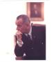 Photograph: [President Lyndon Baines Johnson leaning on arm, wider shot]