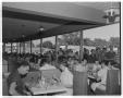 Photograph: [Customers eating inside Youngblood's Fried Chicken restaurant]